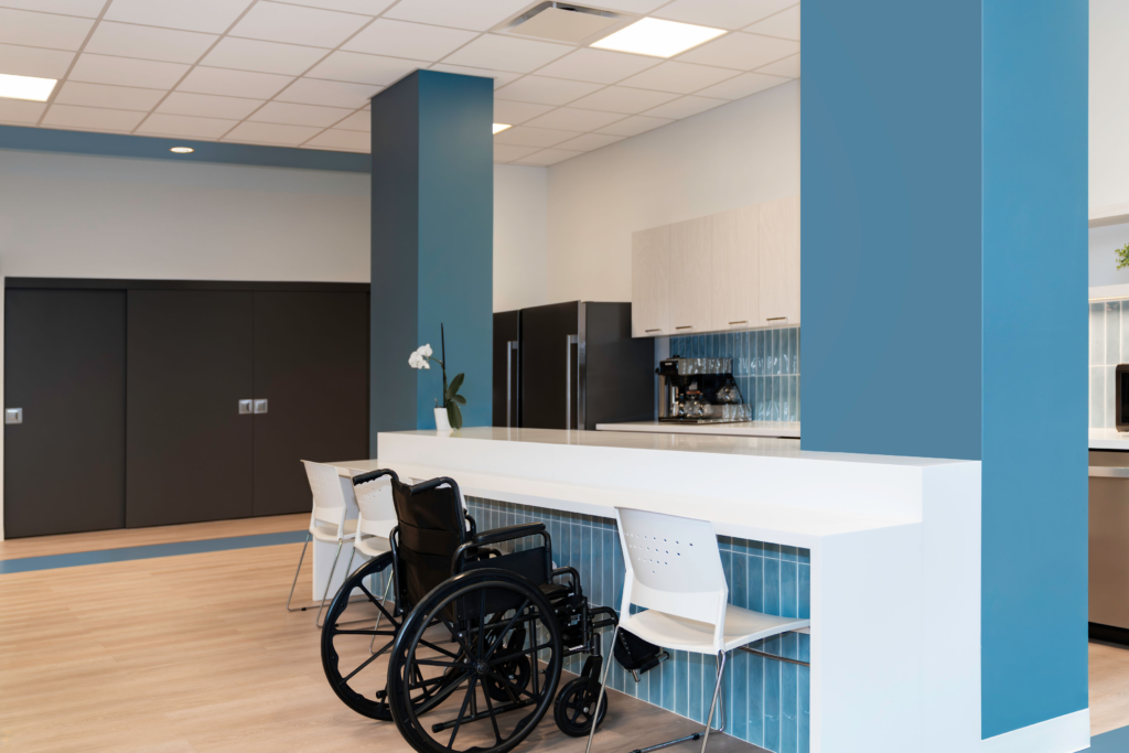 progress place indoor seating area showing a lower tabletop with open space for comfortable access for people with wheelchairs